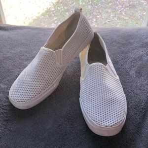Divided White “Vans” Slip-ons